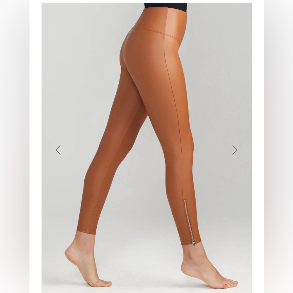 Yummie faux leather shaping leggings with ankle zip. Never worn.